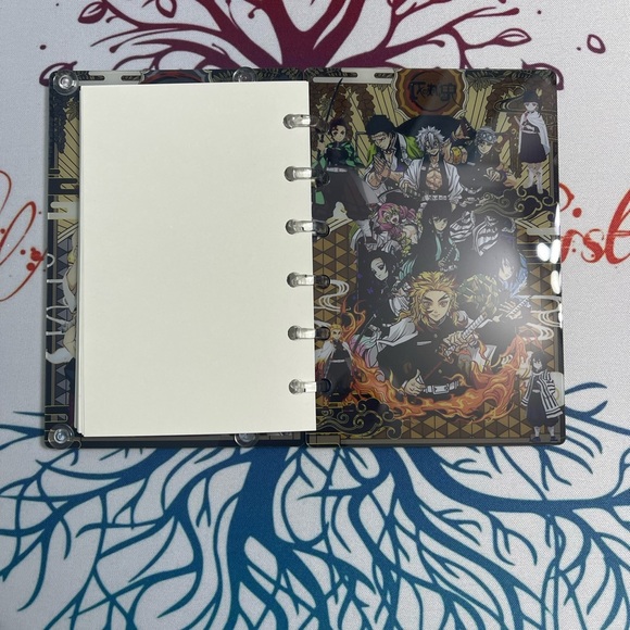 Anime-Themed A7 Shaker Notebook with Black and Gold Cover - Picture 4 of 4